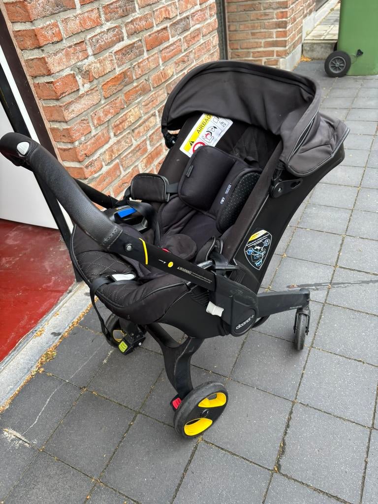 Doona baby autostoel met wieltjes, Ophalen, Gebruikt