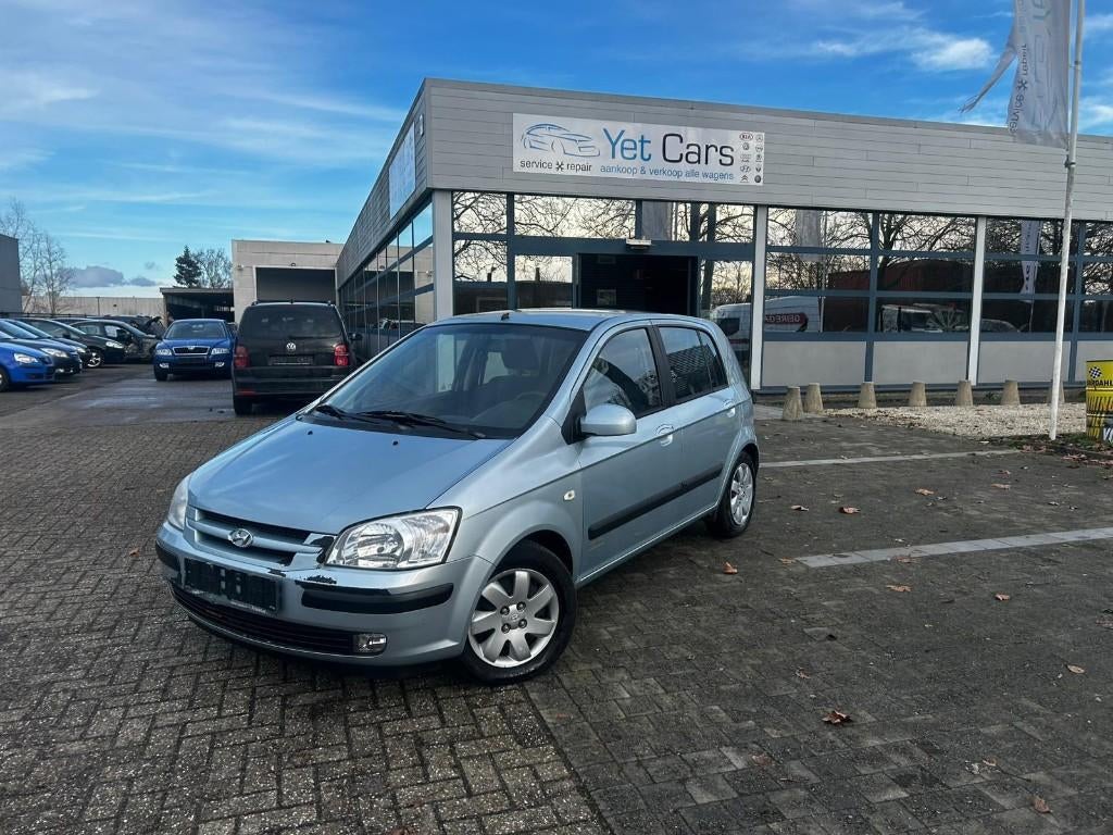 Hyundai Getz benzine met keurig verkoop, Auto's, Hyundai, Voorwielaandrijving, 4 deurs, Zwart, 4 cilinders