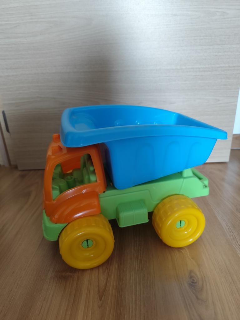 Vrachtwagen met afvalcontainer, Ophalen