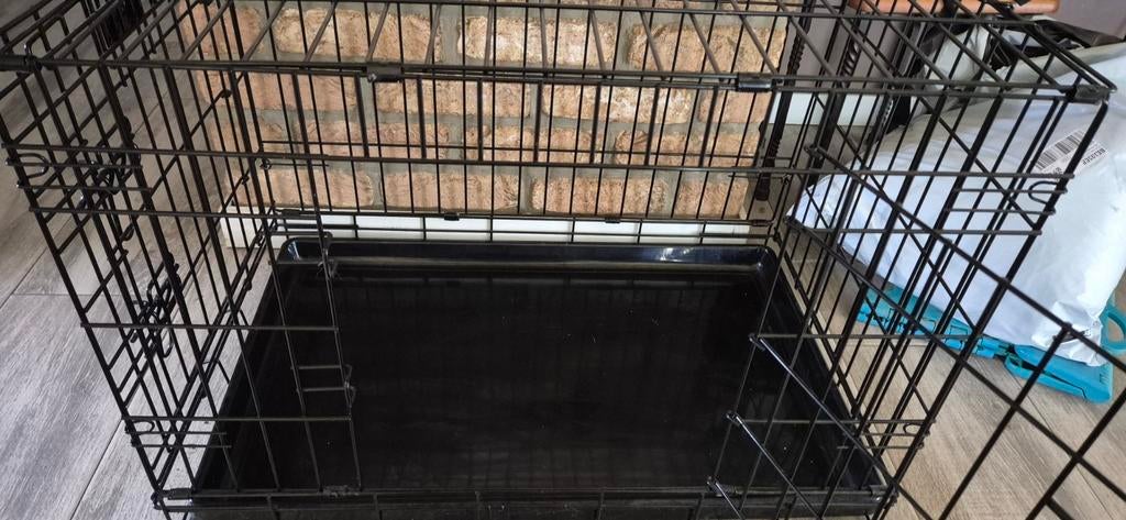 Cage pour chien, Ophalen
