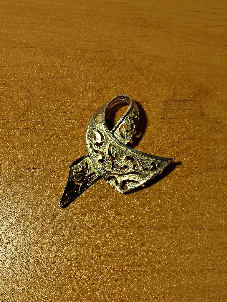 Vintage capri vergulde lintbroche uit de jaren 50, Handtassen en Accessoires, Ophalen, Overige materialen, Broche, Verguld