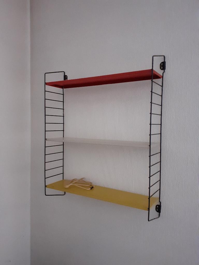 Tomado boekenrekje boekenplank, Enlèvement