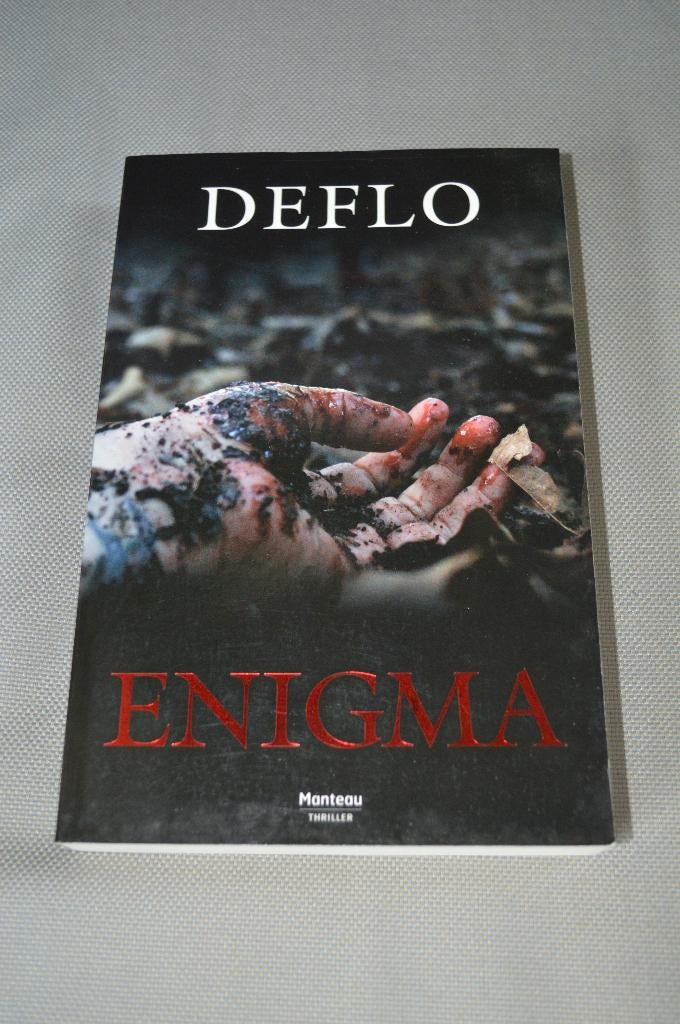 Leesboek :ENIGMA van de DEFLO, Boeken, België, Ophalen of Verzenden, Zo goed als nieuw, Luc Deflo