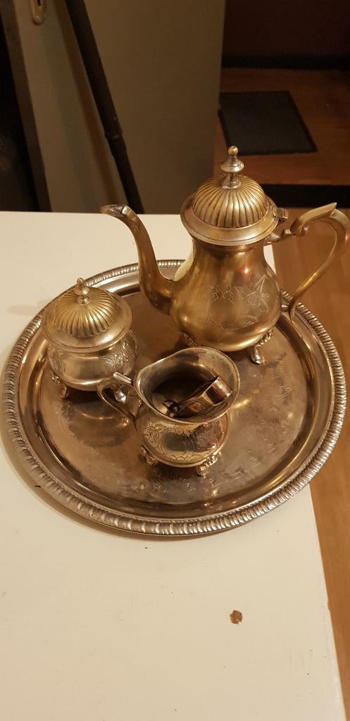 Koffie servies zilver, Ophalen
