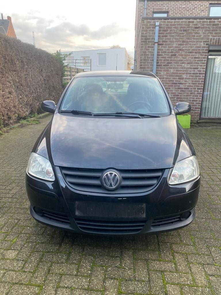Volkswagen Fox Benzine E4 jaar 2009 met keuring KM 150000, Auto's, Volkswagen, Achterwielaandrijving, Zwart, Bedrijf, Grijs