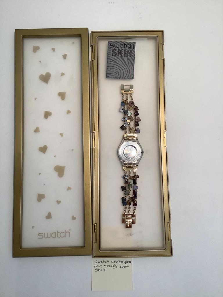 Swatch collectors item 2004 SKIN, Handtassen en Accessoires, Horloges | Dames, Ophalen of Verzenden, Zo goed als nieuw, Swatch