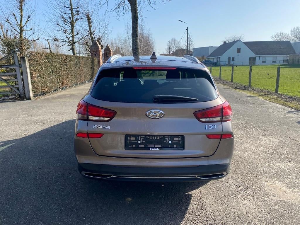 Hyundai i30 Wagon - Limited Edition Automaat, Auto's, Hyundai, Stof, Euro 6, Beige, Bedrijf