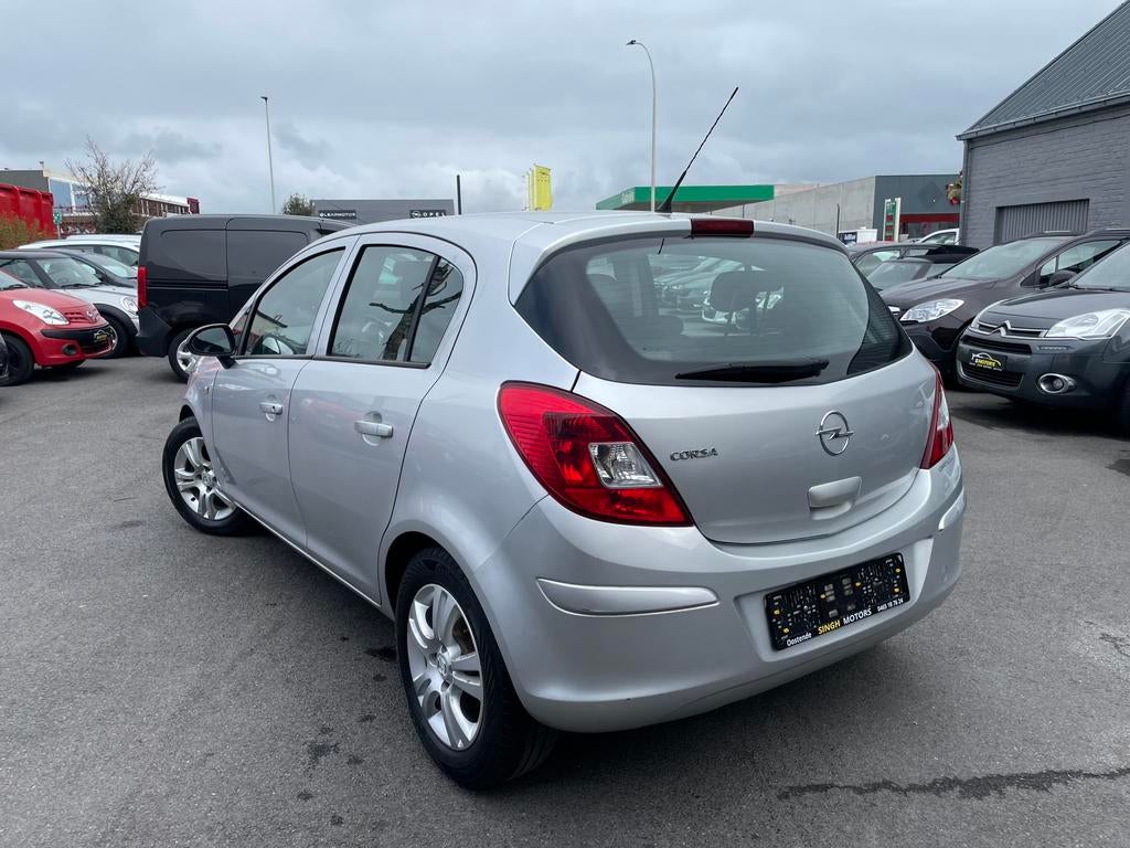 Opel Corsa 1.2 benzine | Airco | GARANTIE •77.435 km•, Autos, Argent ou Gris, Achat, Entreprise, Boîte manuelle
