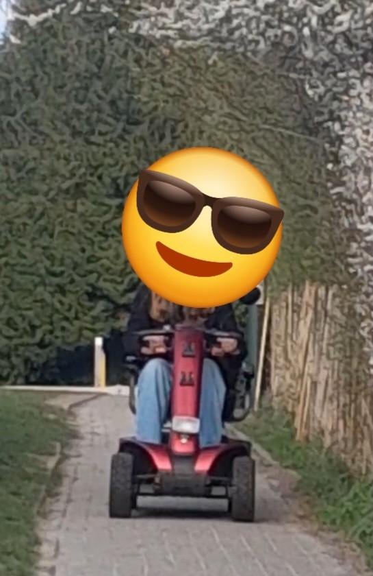 Scootmobiel met lader