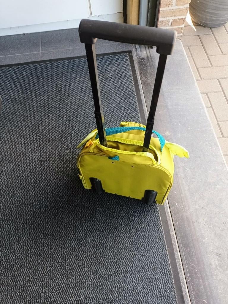 Boekentas of koffer op wieltjes, Ophalen