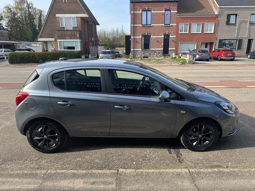 Opel Corsa Enjoy 1.4 Automaat met navigatie, slechts 34100KM, Stof, Gebruikt, Euro 6, 4 cilinders