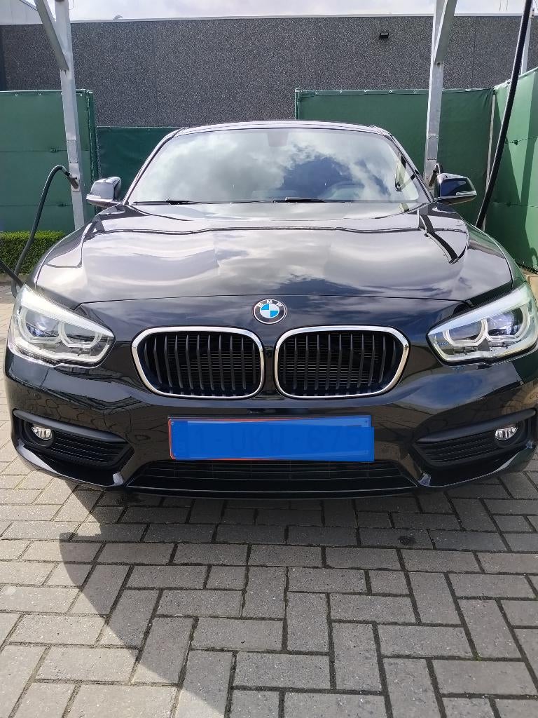 BMW 116i  (2018) - 30.000 km - 1ste eigenaar - Carpass - KVV, Auto's, BMW, 116 g/km, Zwart, Particulier, 3 cilinders