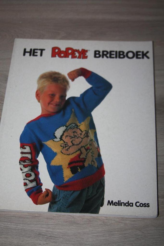 Het Popeye breiboek (Melinda Coss) SC 1990, Enlèvement ou Envoi, Utilisé, Tricot, Patron ou Livre