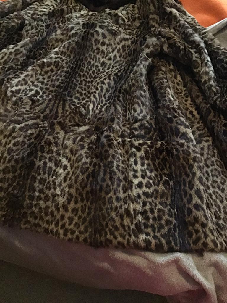 Manteau en fourrure, Enlèvement, Comme neuf