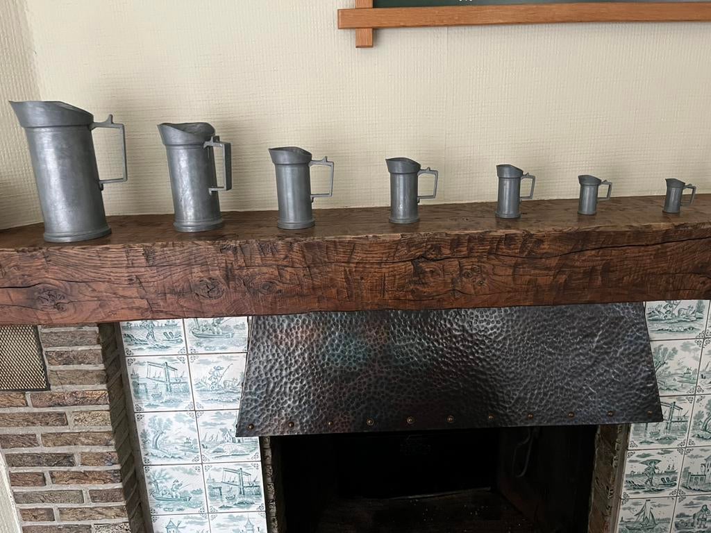 Reeks tinnen (?) maatbekers, Ophalen, Gebruikt