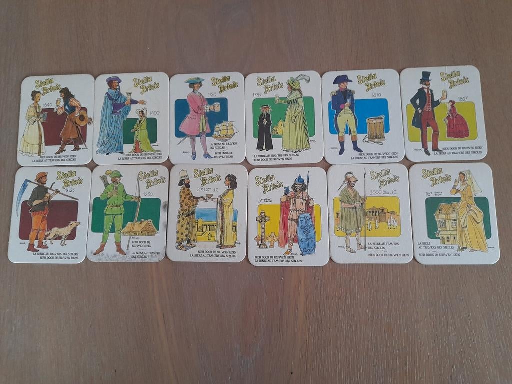 12 bierviltjes  Stella artois  door de eeuwen heen, Verzamelen, Ophalen of Verzenden, Stella Artois