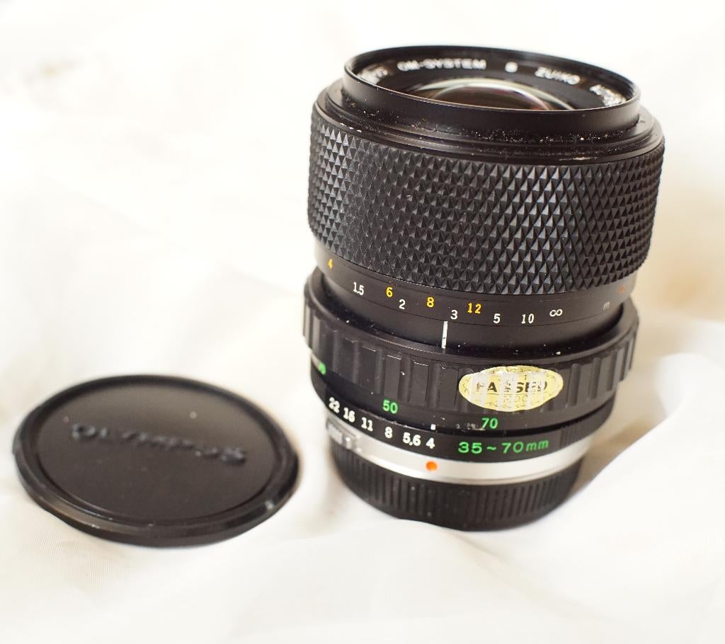 Olympus S. Zuiko auto-zoom 35-70mm f/4 in nieuwstaat, Ophalen of Verzenden, Zo goed als nieuw, Spiegelreflex, Olympus