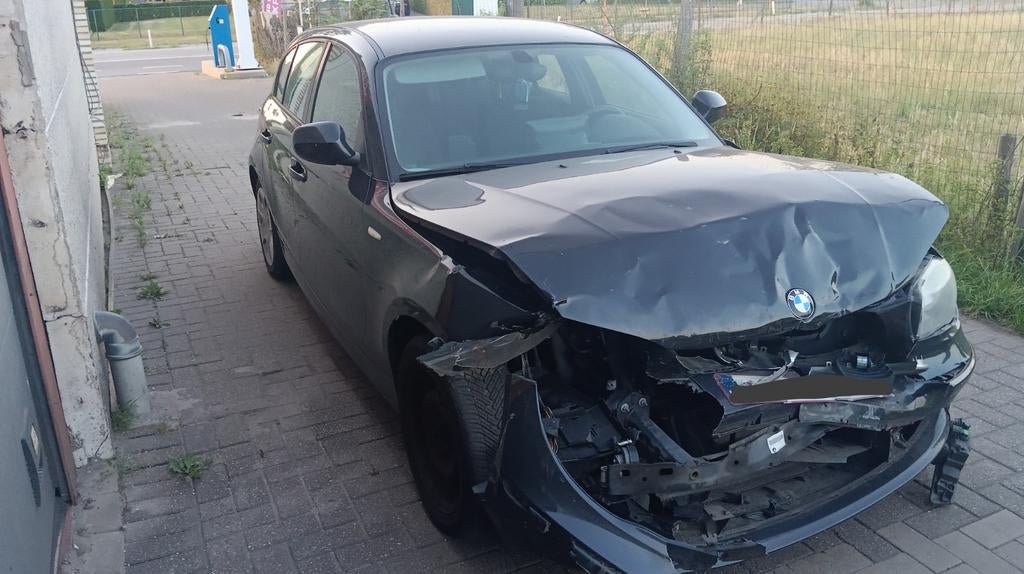 Te koop: BMW 1 Serie 116 benzine. 2011, Auto's, BMW, Euro 5, Zwart, 4 cilinders, 65 kW