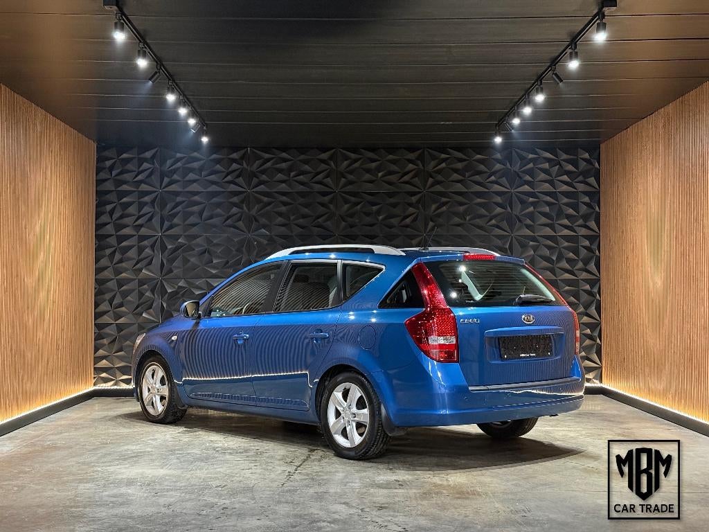 ✅ Kia Cee'd SW 1.4i GARANTIE Airco Parksensoren 1.Eigenaar, Voorwielaandrijving, Euro 5, Stof, Zwart