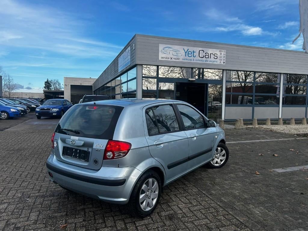 Hyundai Getz benzine met keurig verkoop, Auto's, Hyundai, Voorwielaandrijving, 4 deurs, Zwart, 4 cilinders