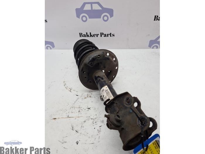 Schokdemper links-voor van een Opel Corsa, Gebruikt, -, -, Opel