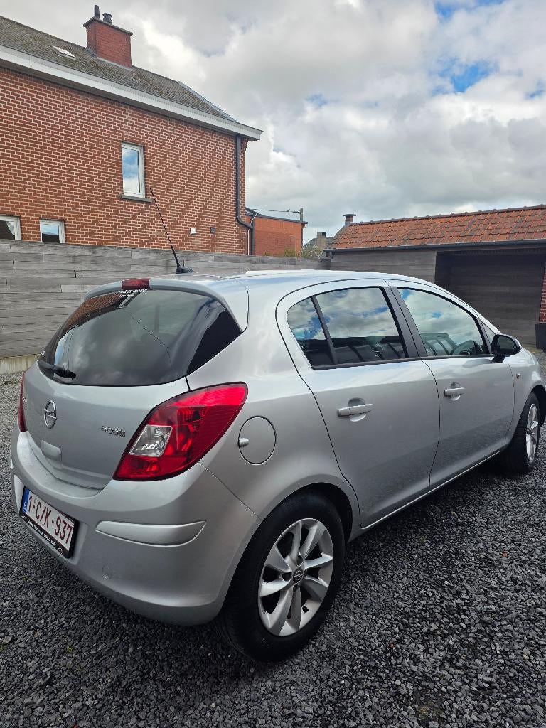6950€ Opel Corsa E 1.2i benzine Euro5b met Car-Pass, Auto's, Opel, Stof, Zwart, Handgeschakeld, 5 deurs