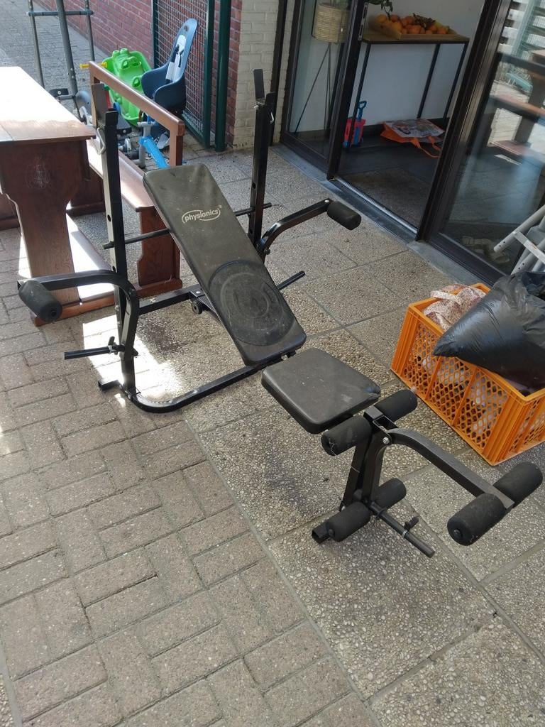 Fitness bank met gewichten, Ophalen