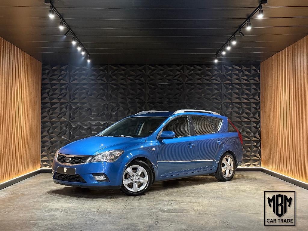 ✅ Kia Cee'd SW 1.4i GARANTIE Airco Parksensoren 1.Eigenaar, Voorwielaandrijving, Euro 5, Stof, Zwart