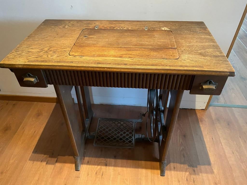 Naaimachine Anker, Ophalen