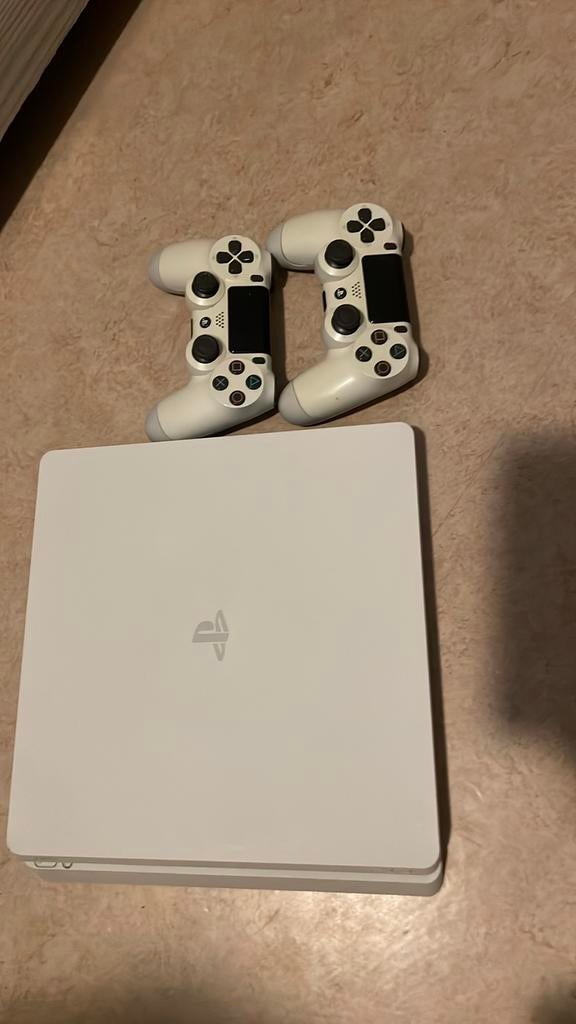 Playstation 4 wit 2 controllers en alle kabels, Games en Spelcomputers, Spelcomputers | Sony PlayStation 4, Ophalen, Zo goed als nieuw