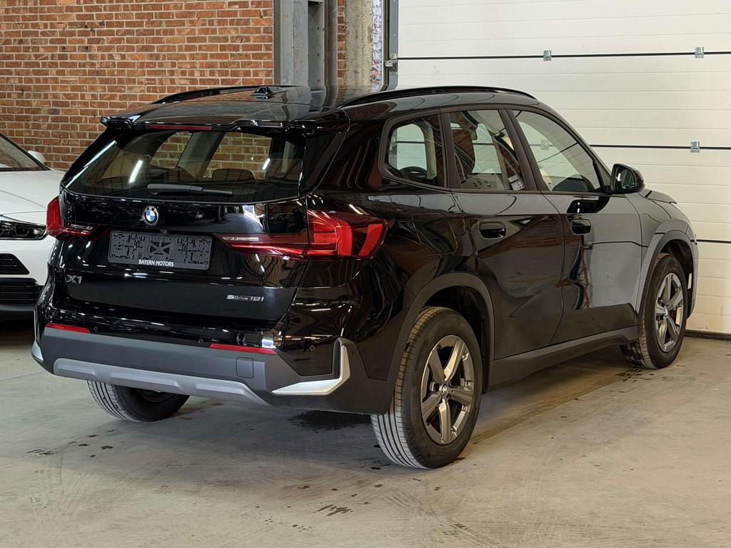 BMW X1 sDrive18i Automaat Benzine Navi LED Garantie 2023, Auto's, BMW, 135 pk, Stof, Gebruikt, Zwart