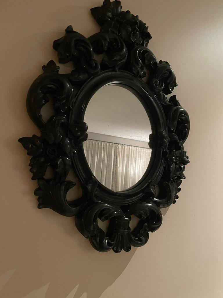 Zwarte barok spiegel, Ophalen