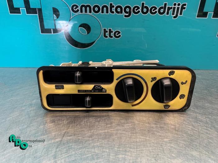 Panneau de commandes chauffage d'un Toyota Starlet (Starlet, -, 3 mois de garantie, Toyota, Utilisé