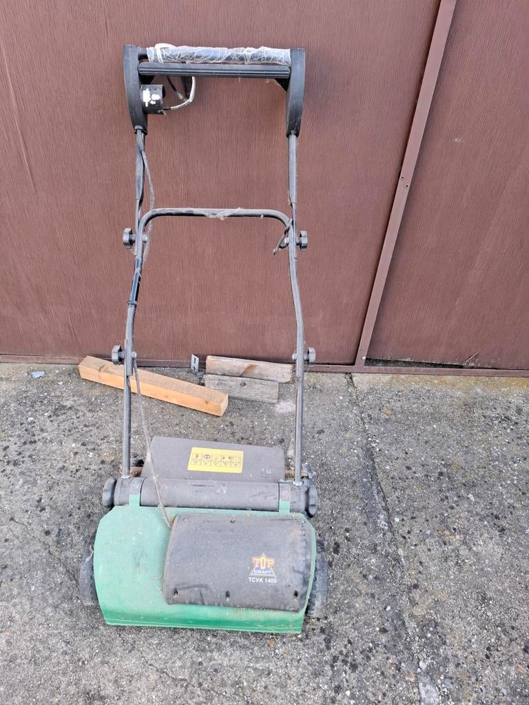 Verticuteermachine topcraft, Ophalen