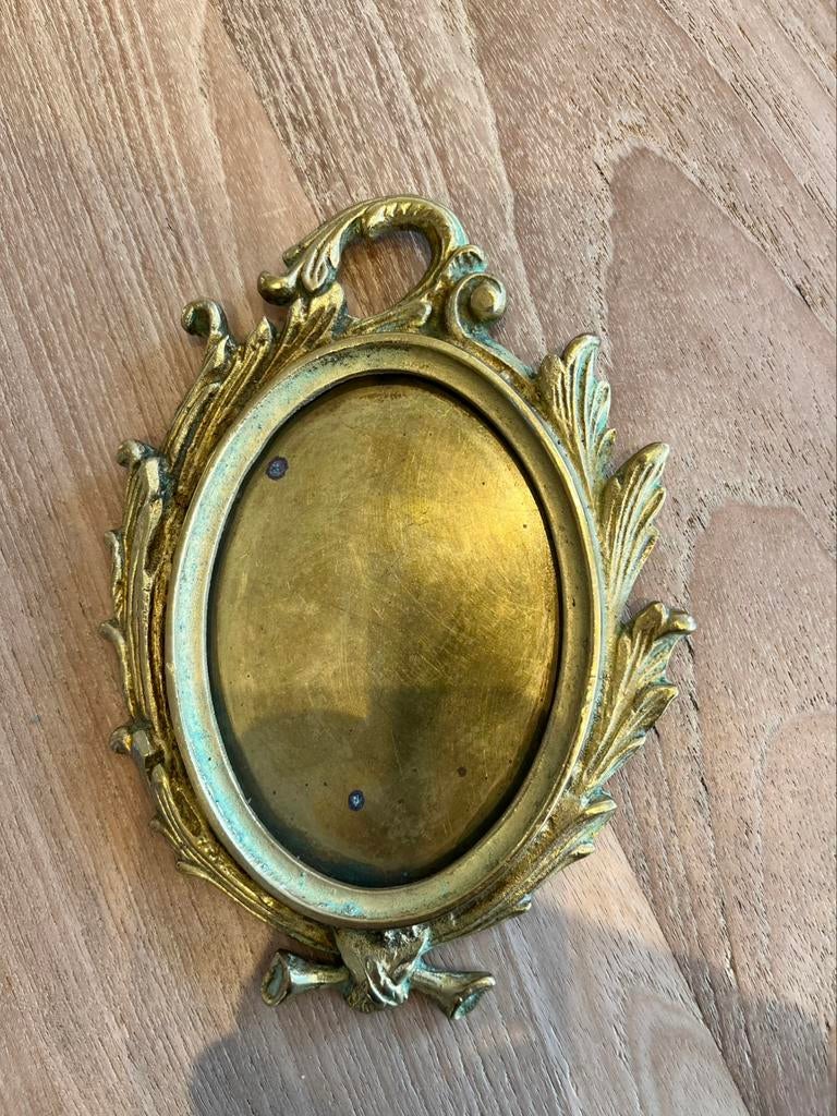 Fotokader brons, Ophalen