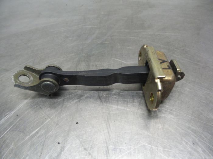 Butée 2portes gauche d'un Nissan Micra (Micra 03-), -, Utilisé, -, Nissan