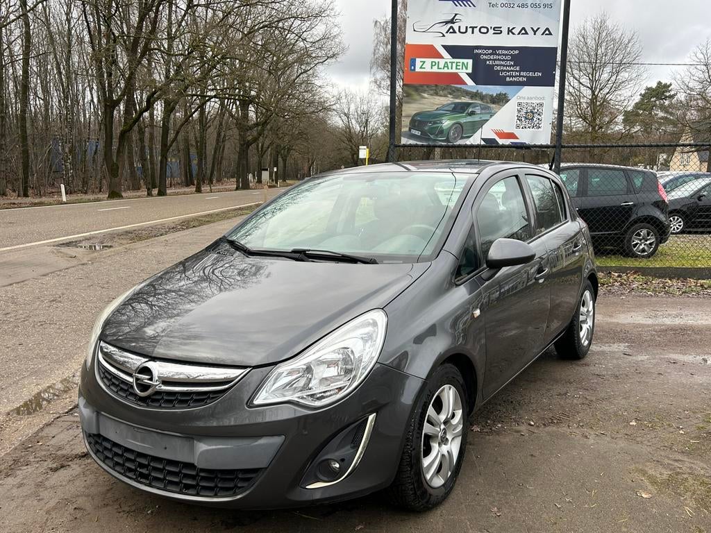 Opel corsa 1.3 diesel km 201.000 bj 2011, Auto's, Voorwielaandrijving, Stof, Zwart, 4 cilinders