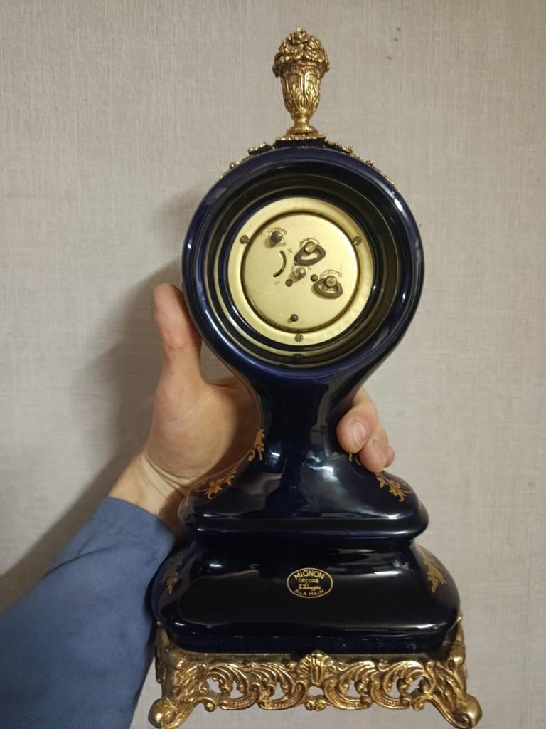 Antieke Limoges opwindklok, Ophalen