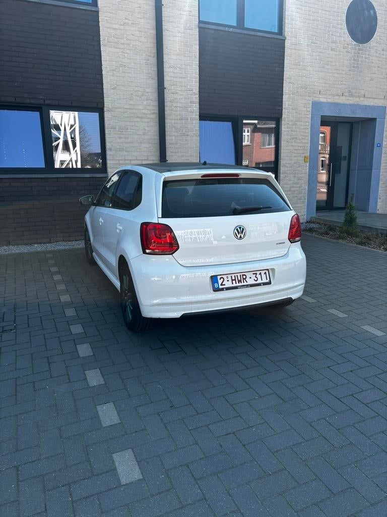 Volkswagen Polo 1.2 TDI Bluemotion Comfortline, Auto's, Euro 5, Start-stop-systeem, Zwart, Wit