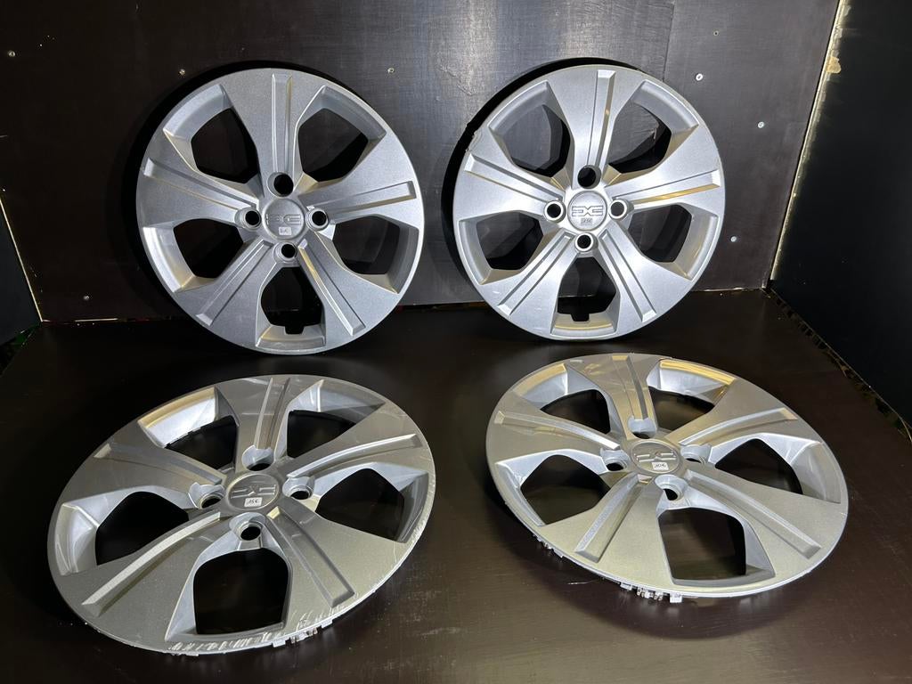 4 Dacia Sandero Logan 15" wieldoppen, Auto diversen, Wieldoppen, Gebruikt, Ophalen of Verzenden