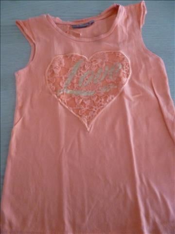 oranje topje maat 122 - 128, Ophalen of Verzenden, Zo goed als nieuw, Meisje, Shirt of Longsleeve