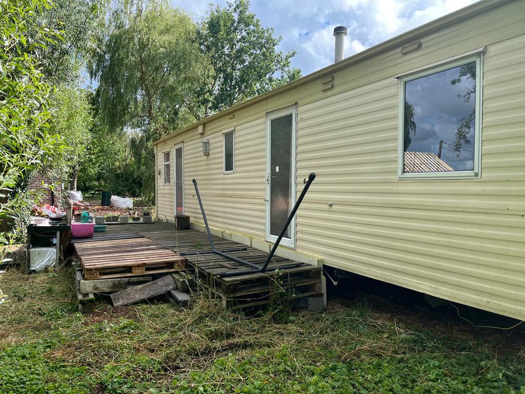 Ruime stacaravan 11x3,7m, 3 slaapkamers full electric, Tot en met 3