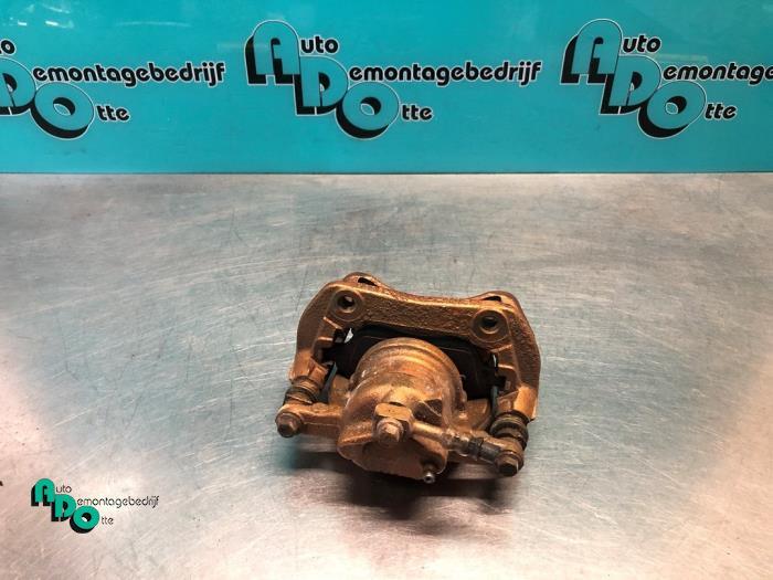 Etrier de frein (pince) avant gauche d'un Opel Corsa (Corsa, -, Opel, 3 mois de garantie, Utilisé