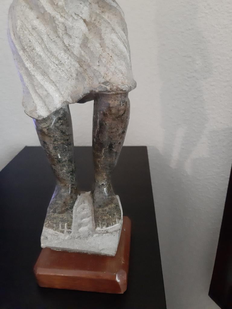 Afrikaanse beeld van vrouw, Ophalen