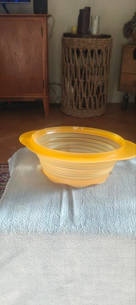 Tupperware vergiet, Ophalen