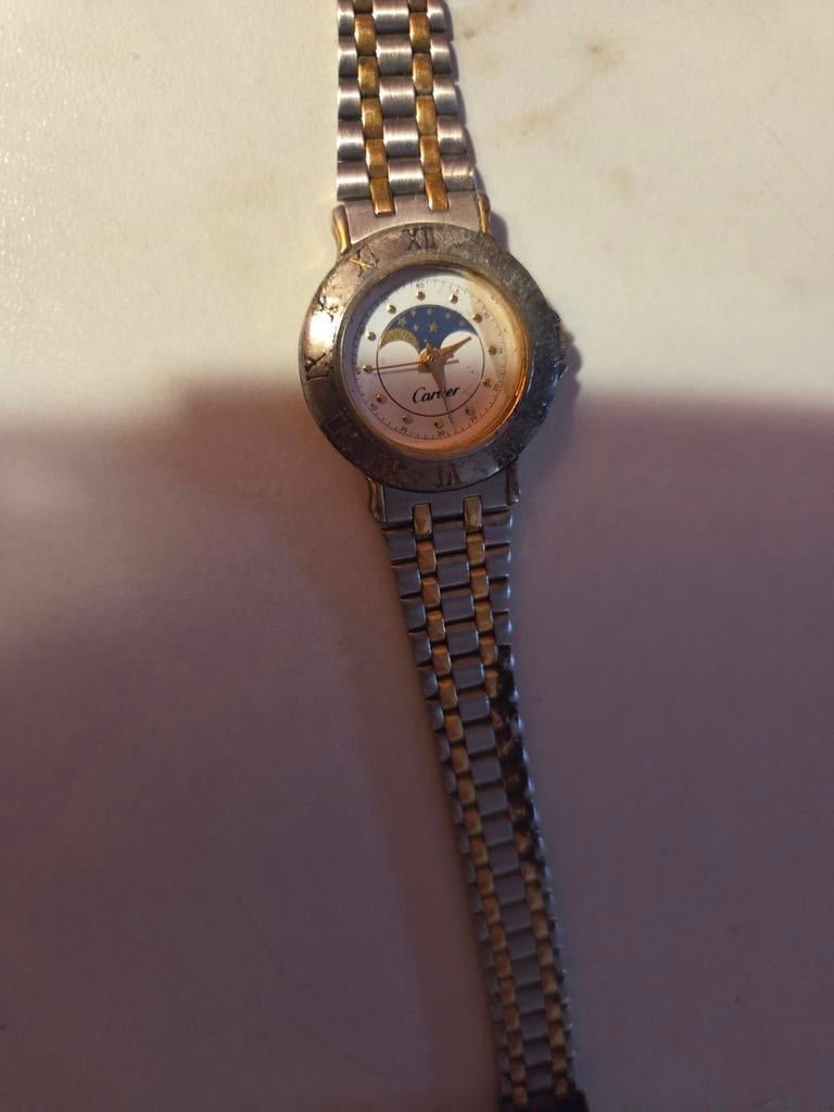 Montre cartier, Or, Or