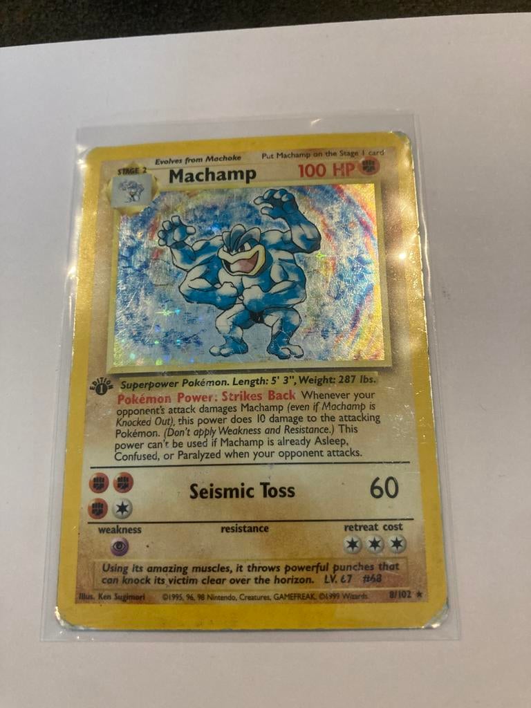 First edition Machamp, Hobby en Vrije tijd, Verzamelkaartspellen | Pokémon, Ophalen of Verzenden, Zo goed als nieuw