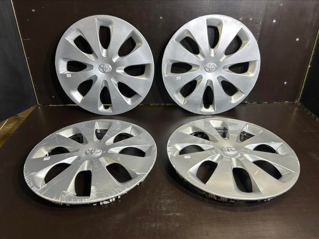 4 enjoliveurs Toyota verso yaris aygo corolla 15", Autos : Divers, Enjoliveurs, Enlèvement ou Envoi, Utilisé