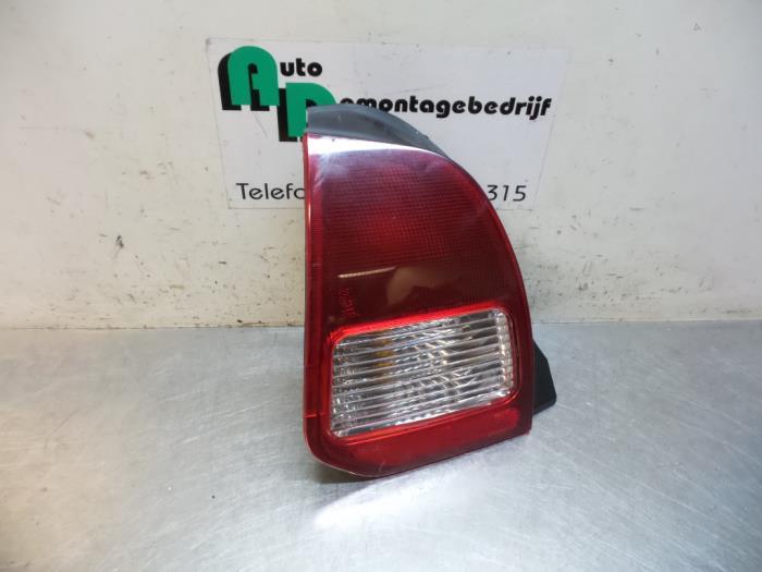 Feu arrière gauche d'un Mitsubishi Colt (Colt 96-), -, 3 mois de garantie, Utilisé, Mitsubishi