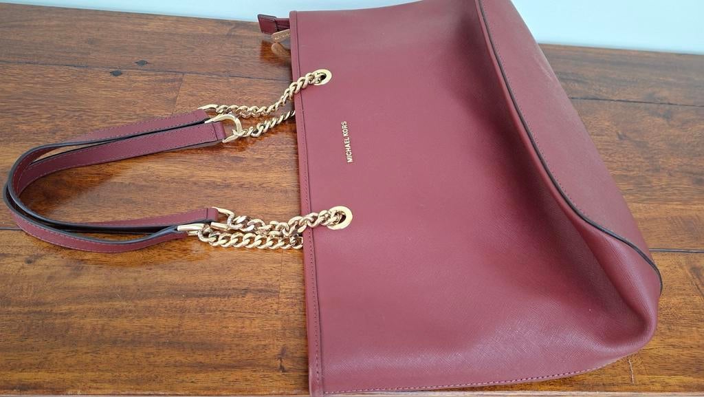 Michael Kors sac dame, Enlèvement